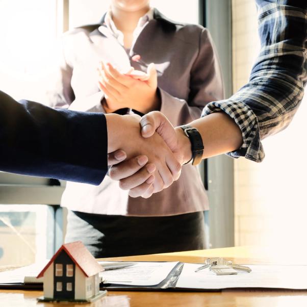 real-estate-appraiser-and-client-shaking-hands-together