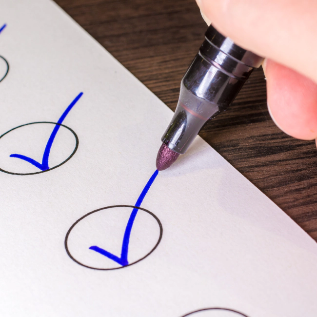 white paper with blue checkouts